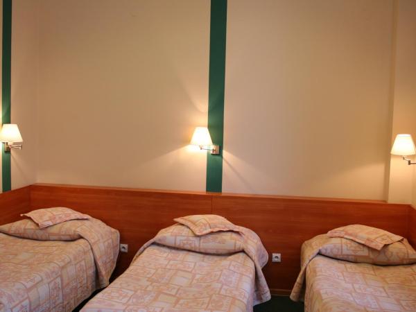 Amicus Żoliborz : photo 1 de la chambre chambre triple standard