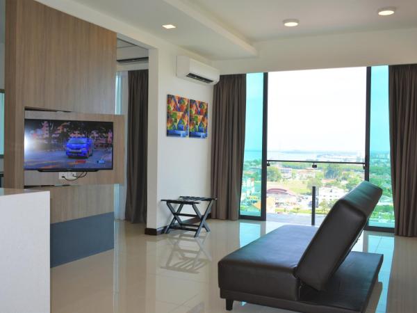 D'Wharf Hotel & Serviced Residence : photo 1 de la chambre suite exécutive - vue sur ville 
