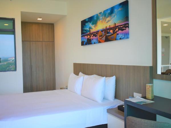 D'Wharf Hotel & Serviced Residence : photo 3 de la chambre suite exécutive - vue sur ville 