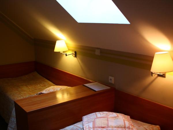 Amicus Żoliborz : photo 4 de la chambre petite chambre double