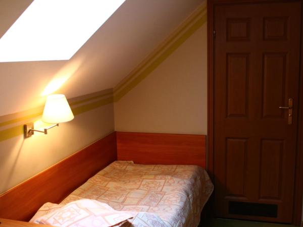 Amicus Żoliborz : photo 2 de la chambre petite chambre double