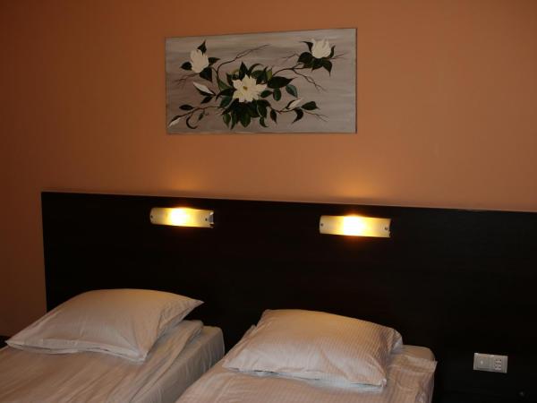 Amicus Żoliborz : photo 4 de la chambre chambre quadruple