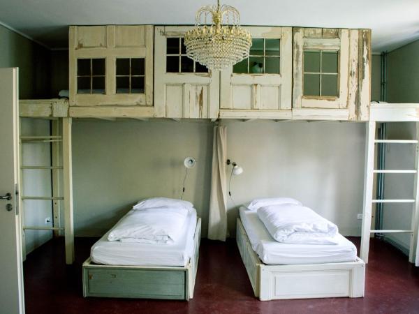 Hostel & Garten Eden : photo 6 de la chambre chambre quadruple avec salle de bains commune