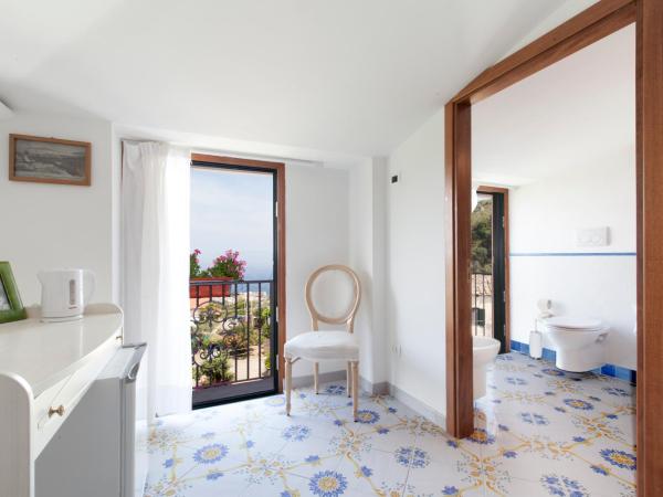 Villa Pane Resort : photo 3 de la chambre chambre triple - vue sur mer