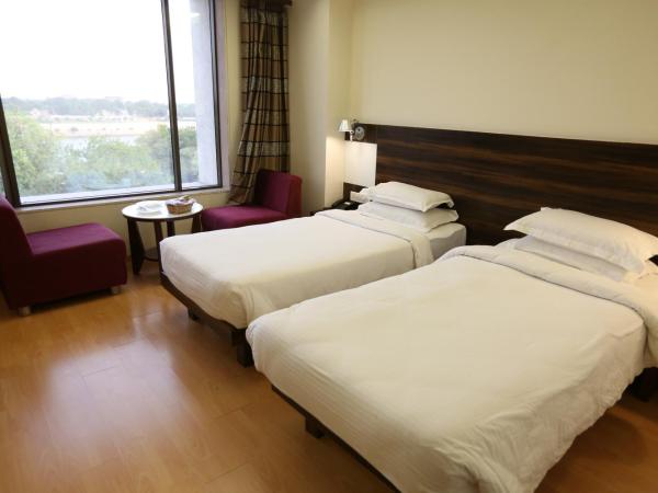 SilverCloud Hotel and Banquets : photo 1 de la chambre chambre double ou lits jumeaux deluxe supérieure 