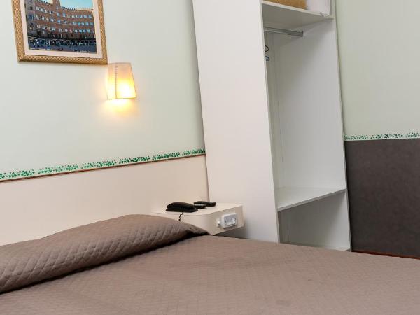 Hotel Residenza - 400m do inicio da Av Paulista e Metrô Paraiso : photo 4 de la chambre suite avec balcon