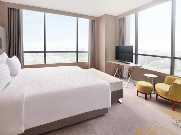 Novotel Samator Surabaya Timur : photo 2 de la chambre suite supérieure lit king-size