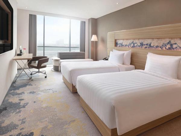 Novotel Samator Surabaya Timur : photo 1 de la chambre chambre lits jumeaux deluxe