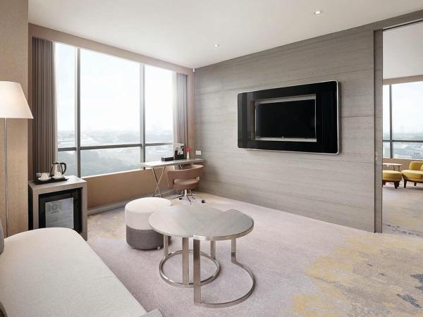 Novotel Samator Surabaya Timur : photo 3 de la chambre suite supérieure lit king-size