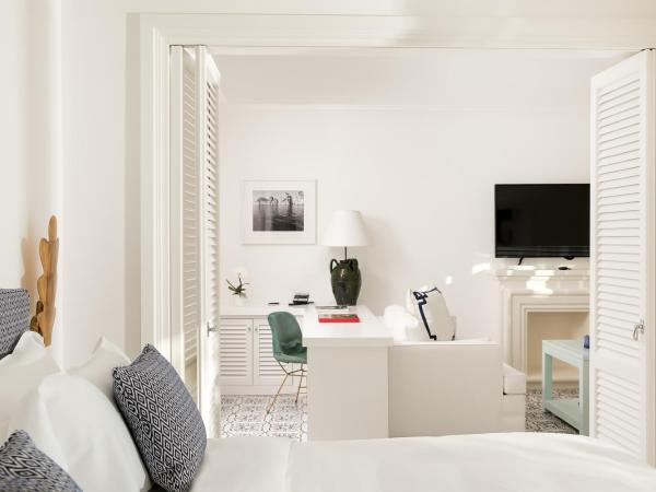 Hotel La Minerva : photo 4 de la chambre chambre lit king-size