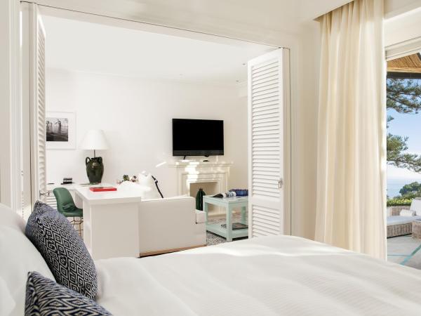 Hotel La Minerva : photo 2 de la chambre chambre lit king-size