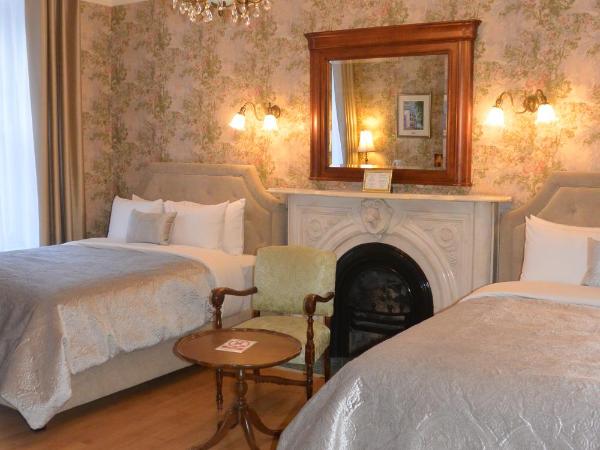 Manoir Sainte Genevieve : photo 2 de la chambre chambre double avec 2 lits doubles