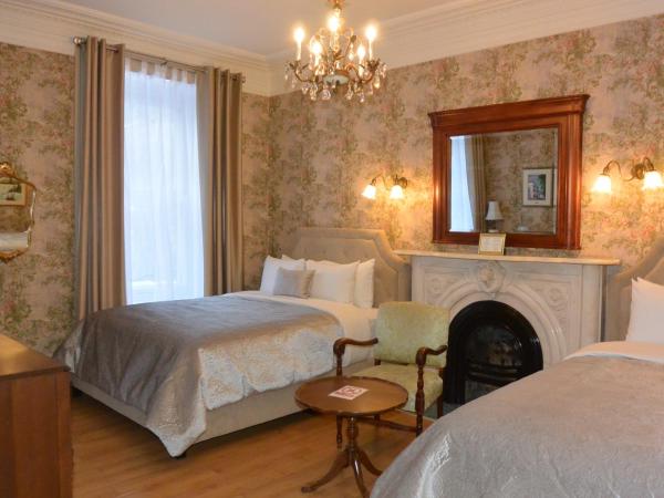 Manoir Sainte Genevieve : photo 3 de la chambre chambre double avec 2 lits doubles