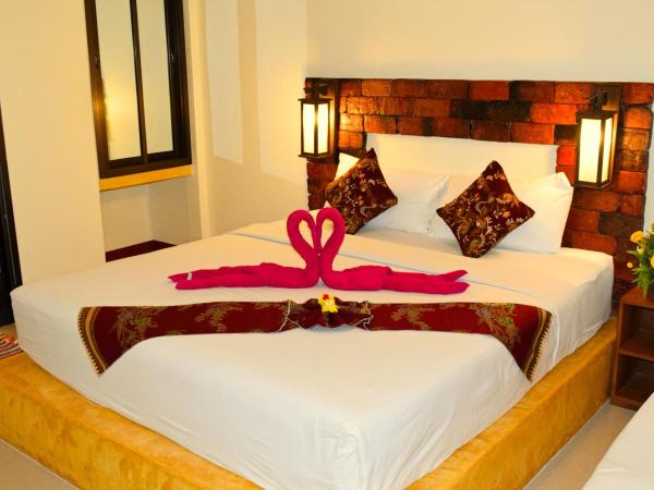 Lanta Pearl Beach Resort : photo 6 de la chambre bungalow avec climatisation