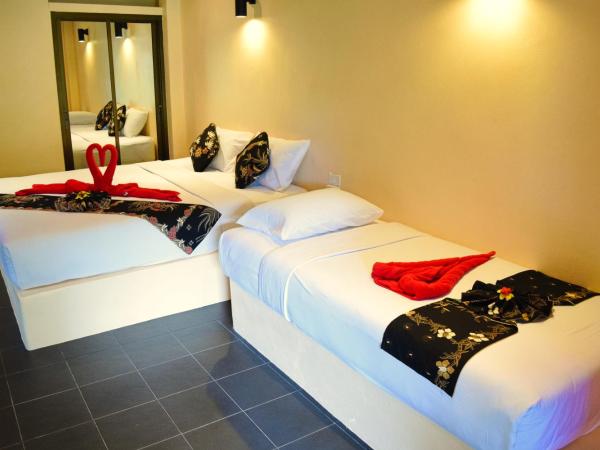 Lanta Pearl Beach Resort : photo 6 de la chambre bungalow familial avec climatisation
