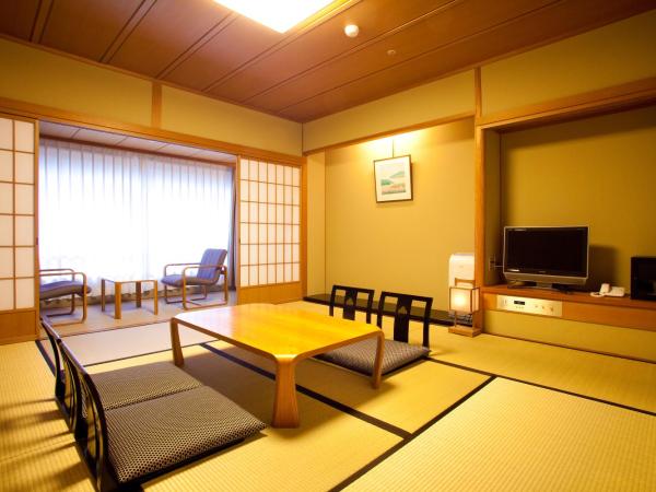 Ranzan : photo 3 de la chambre chambre quadruple de style japonais - vue sur jardin