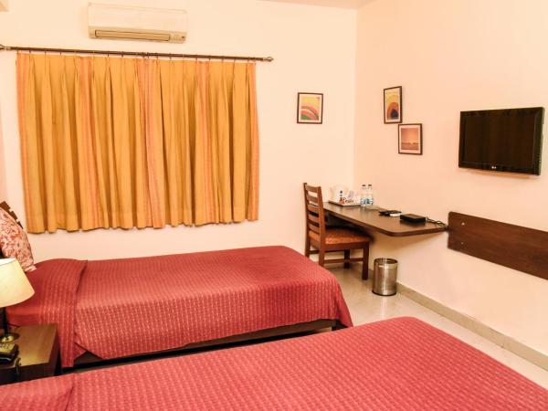 Red Arrow Residency : photo 4 de la chambre chambre deluxe double ou lits jumeaux