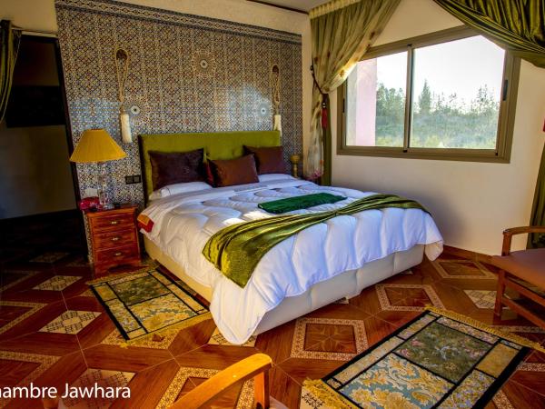 Maison d'hôtes La Ferme AZIZA : photo 2 de la chambre chambre double deluxe (2 adultes + 1 enfant)