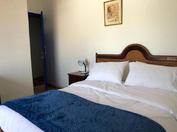 El Muniria : photo 3 de la chambre chambre double avec toilettes communes et douche