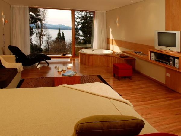 Design Suites Bariloche : photo 5 de la chambre studio lit queen-size de luxe 