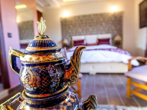 Maison d'hôtes La Ferme AZIZA : photo 1 de la chambre chambre double deluxe (2 adultes + 1 enfant)