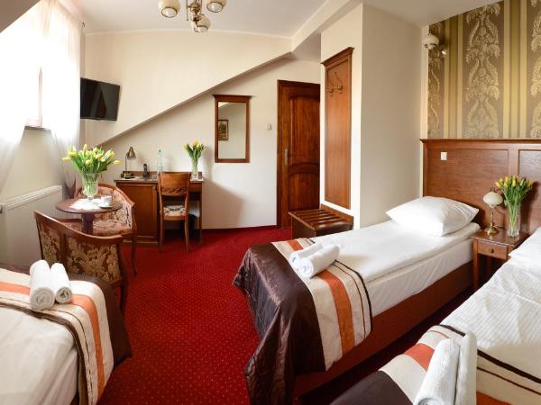 Dworek Vesaria : photo 3 de la chambre chambre triple
