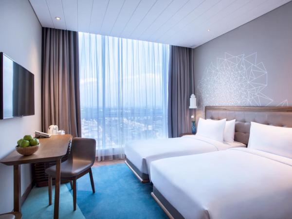 Mercure Jakarta Pantai Indah Kapuk : photo 3 de la chambre chambre lits jumeaux supérieure