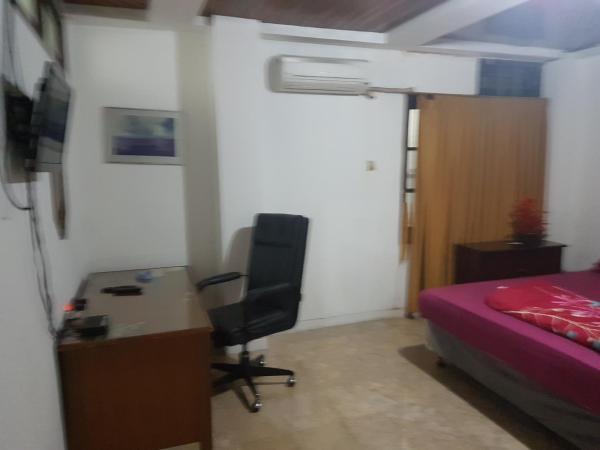 Mayestik Guest House Syariah : photo 9 de la chambre suite deluxe avec lit king-size