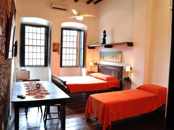 Studio do Carmo Galeria de Artes e Pousada : photo 7 de la chambre suite triple