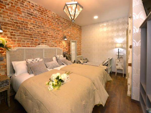 Center Suite Santander : photo 2 de la chambre chambre standard avec lit d'appoint (3 adultes)