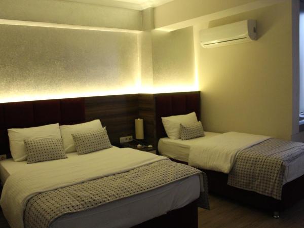 Laleli Hotel Izmir : photo 1 de la chambre chambre triple standard