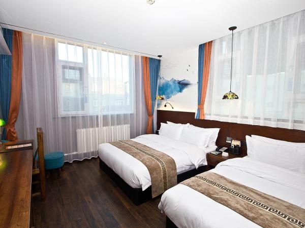 MG Hotel St Michael's Cathedral, Qingdao : photo 2 de la chambre chambre lits jumeaux deluxe