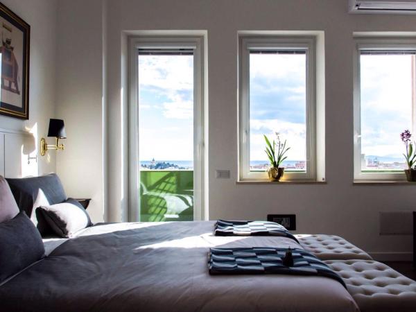 Eleventh Floor Suites : photo 2 de la chambre chambre double ou lits jumeaux avec balcon