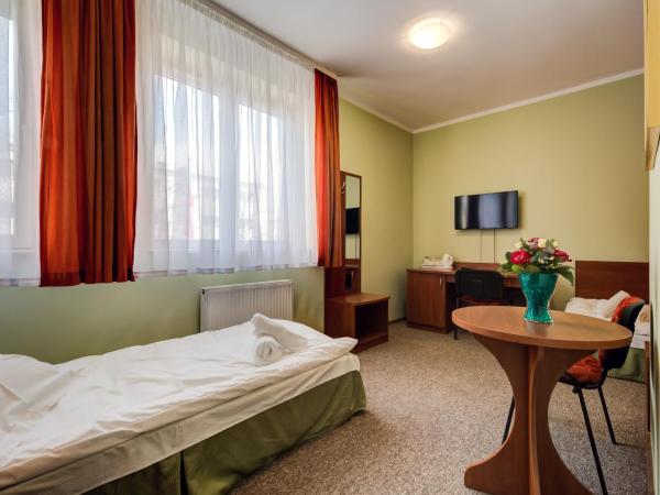 Villa Plaza : photo 6 de la chambre chambre lits jumeaux standard