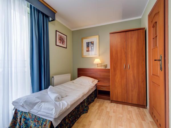 Villa Plaza : photo 9 de la chambre chambre lits jumeaux standard