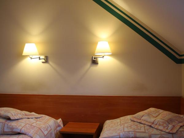 Amicus Żoliborz : photo 1 de la chambre petite chambre double