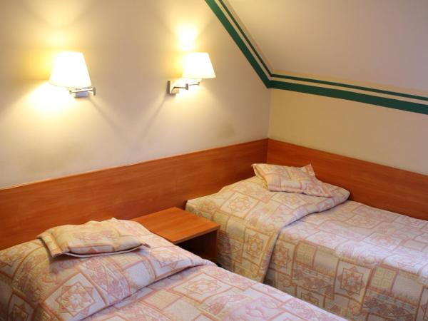 Amicus Żoliborz : photo 3 de la chambre petite chambre double