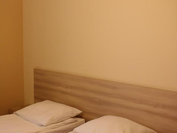 Amicus Żoliborz : photo 2 de la chambre chambre quadruple