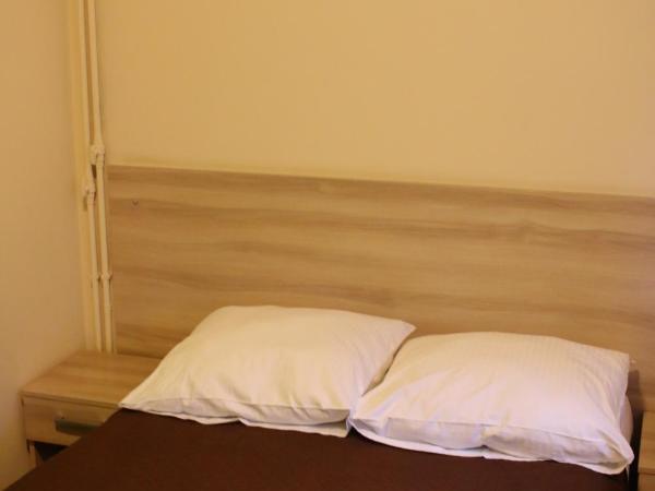 Amicus Żoliborz : photo 3 de la chambre chambre quadruple