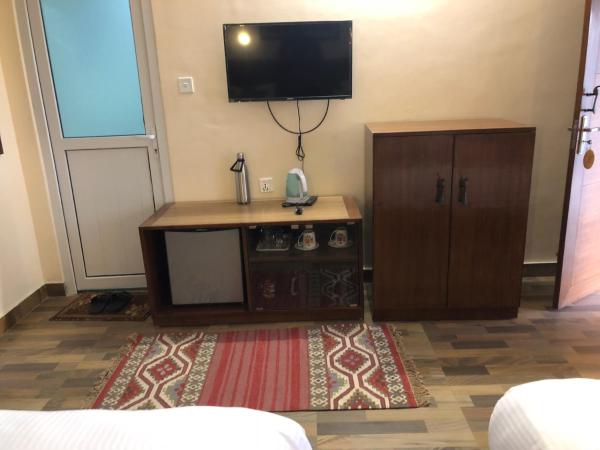 Hotel Guru : photo 10 de la chambre chambre double - vue sur montagne