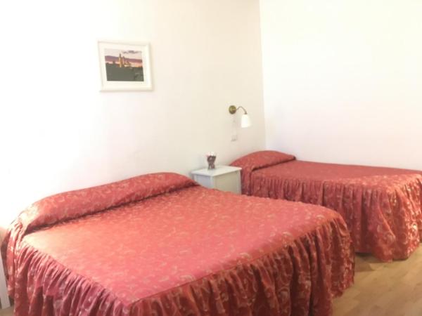 Relais La Corte dei Cavalieri : photo 10 de la chambre chambre triple basique