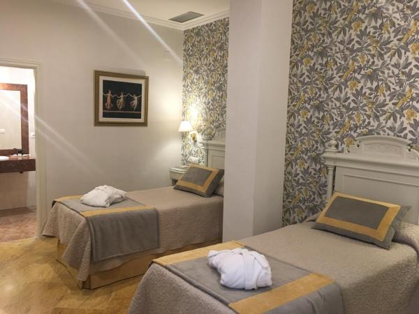 Adriano Boutique Sevilla : photo 8 de la chambre chambre lits jumeaux