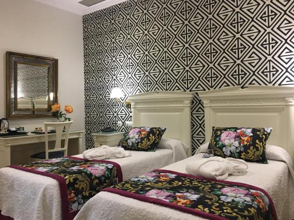 Adriano Boutique Sevilla : photo 3 de la chambre chambre lits jumeaux