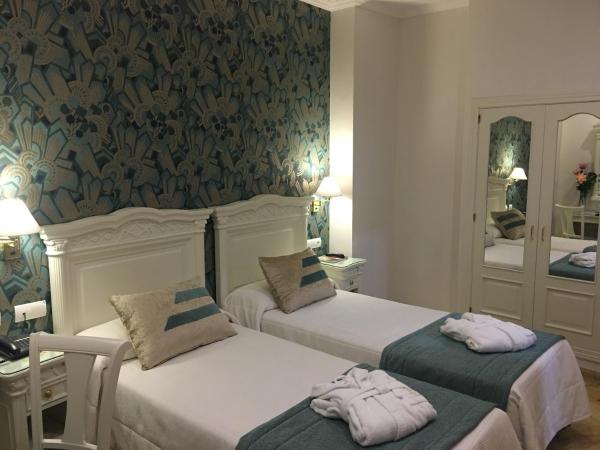 Adriano Boutique Sevilla : photo 5 de la chambre chambre lits jumeaux