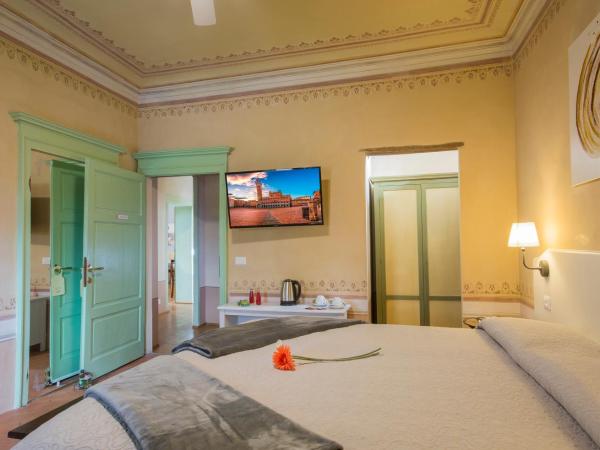 Villa Sant'Andrea : photo 3 de la chambre chambre de luxe double ou lits jumeaux avec baignoire spa