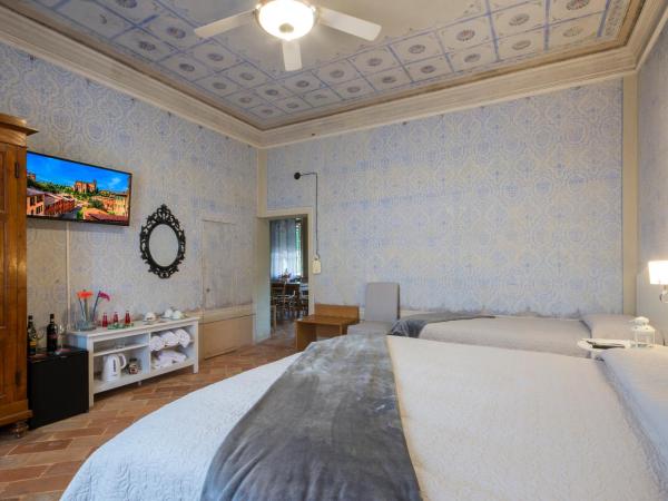 Villa Sant'Andrea : photo 3 de la chambre chambre triple