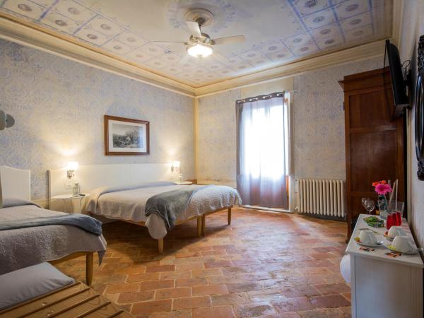 Villa Sant'Andrea : photo 1 de la chambre chambre triple