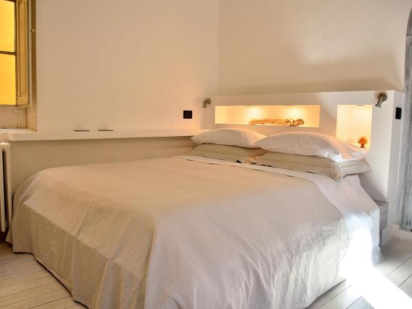 Azzurretta Guest House : photo 1 de la chambre suite junior avec balcon