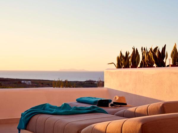 Myst Boutique Hotel : photo 10 de la chambre suite plaisir avec jacuzzi extérieur - vue sur mer et coucher de soleil