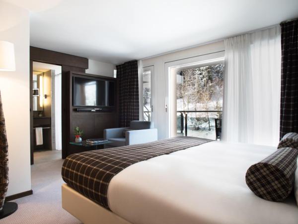 Crans Ambassador : photo 3 de la chambre chambre double de luxe avec vue sur forêt